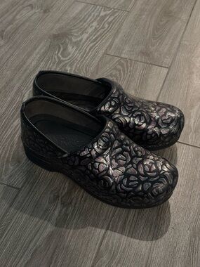 Women’s Black Floral-Textured Dansko Clogs
